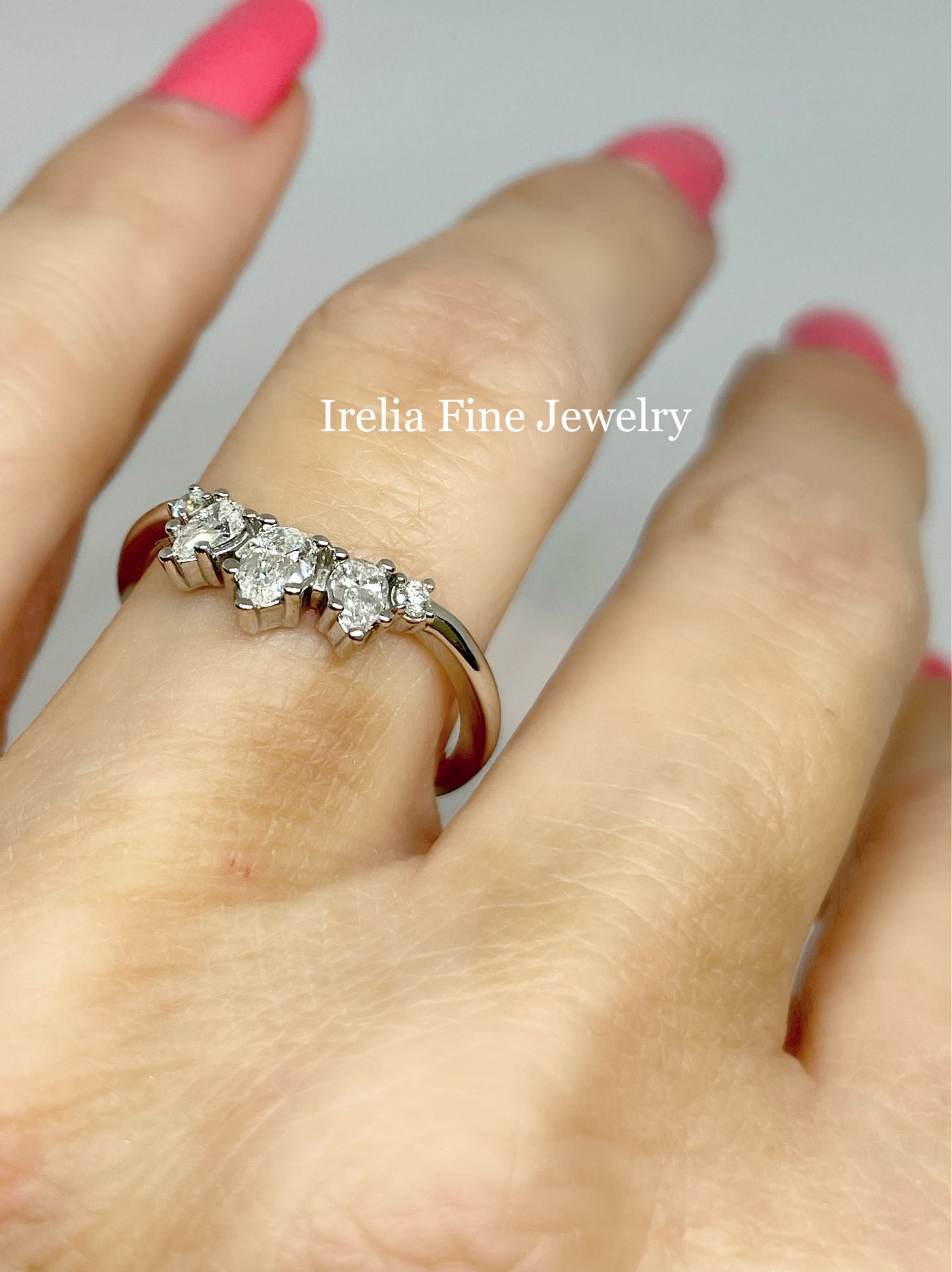 14K White Gold 3/8 CTW Natural Pear Shape Diamond Contour Band