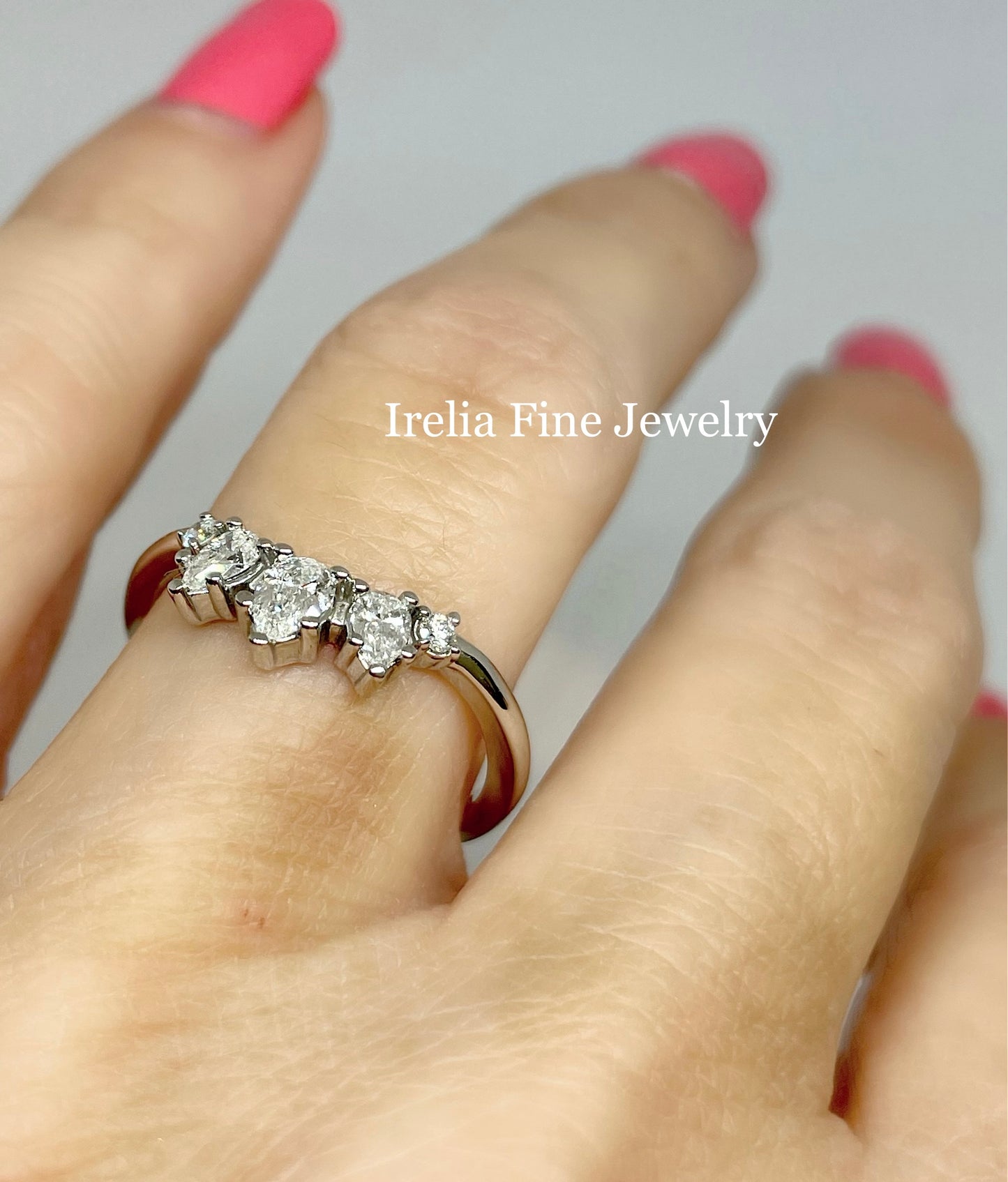 14K White Gold 3/8 CTW Natural Pear Shape Diamond Contour Band